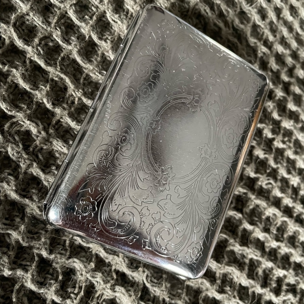 Elegant Silver Floral Engraved Case
